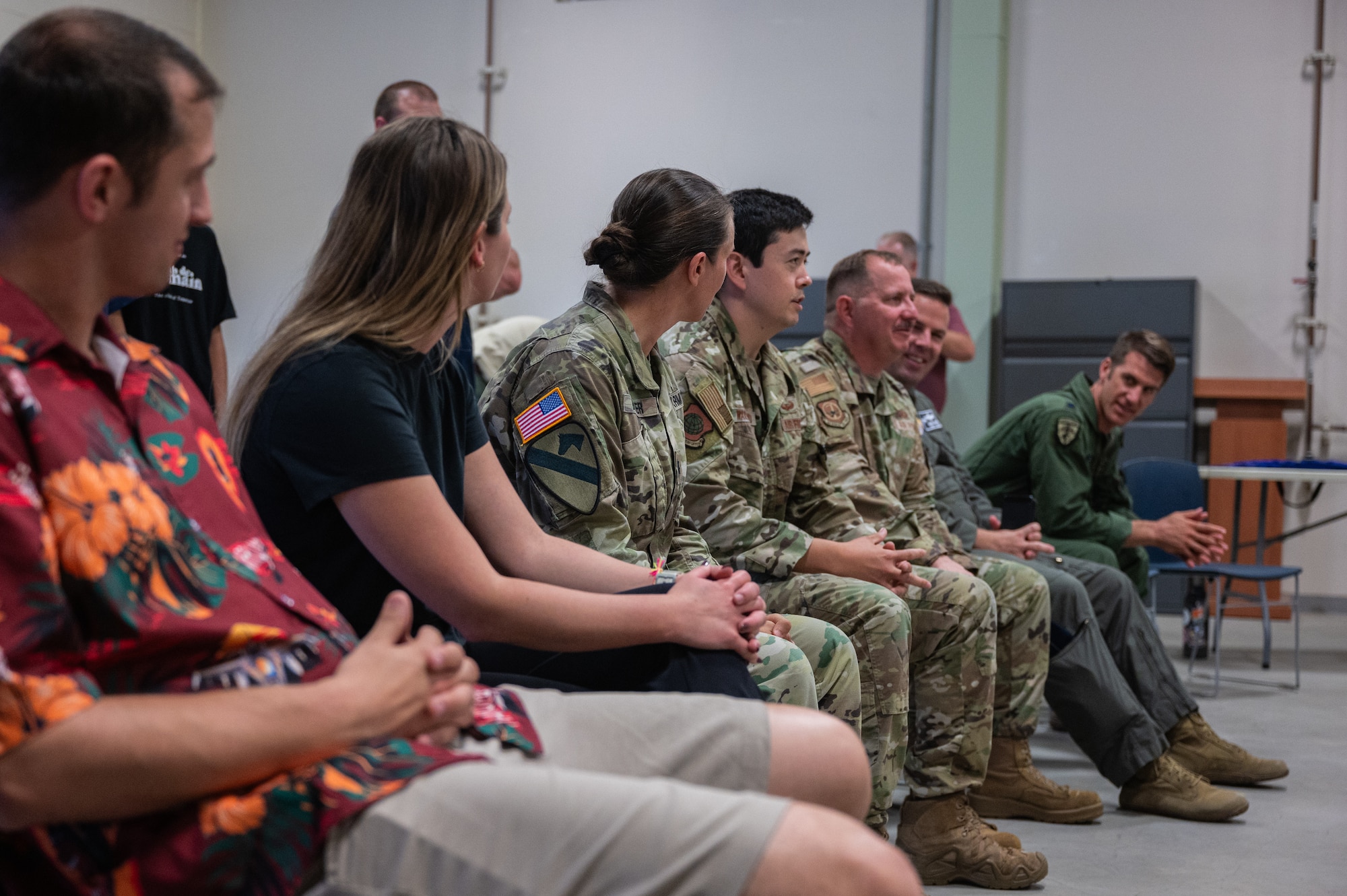 U.S. service members answer questions on a panel during a youth aviation day at Osan Air Base, Republic of Korea, June 15, 2024. The service members volunteered to help with the event by providing time during the day for participants to interact with them and ask questions about their military careers. (U.S. Air Force photo by Airman 1st Class Chase Verzaal)