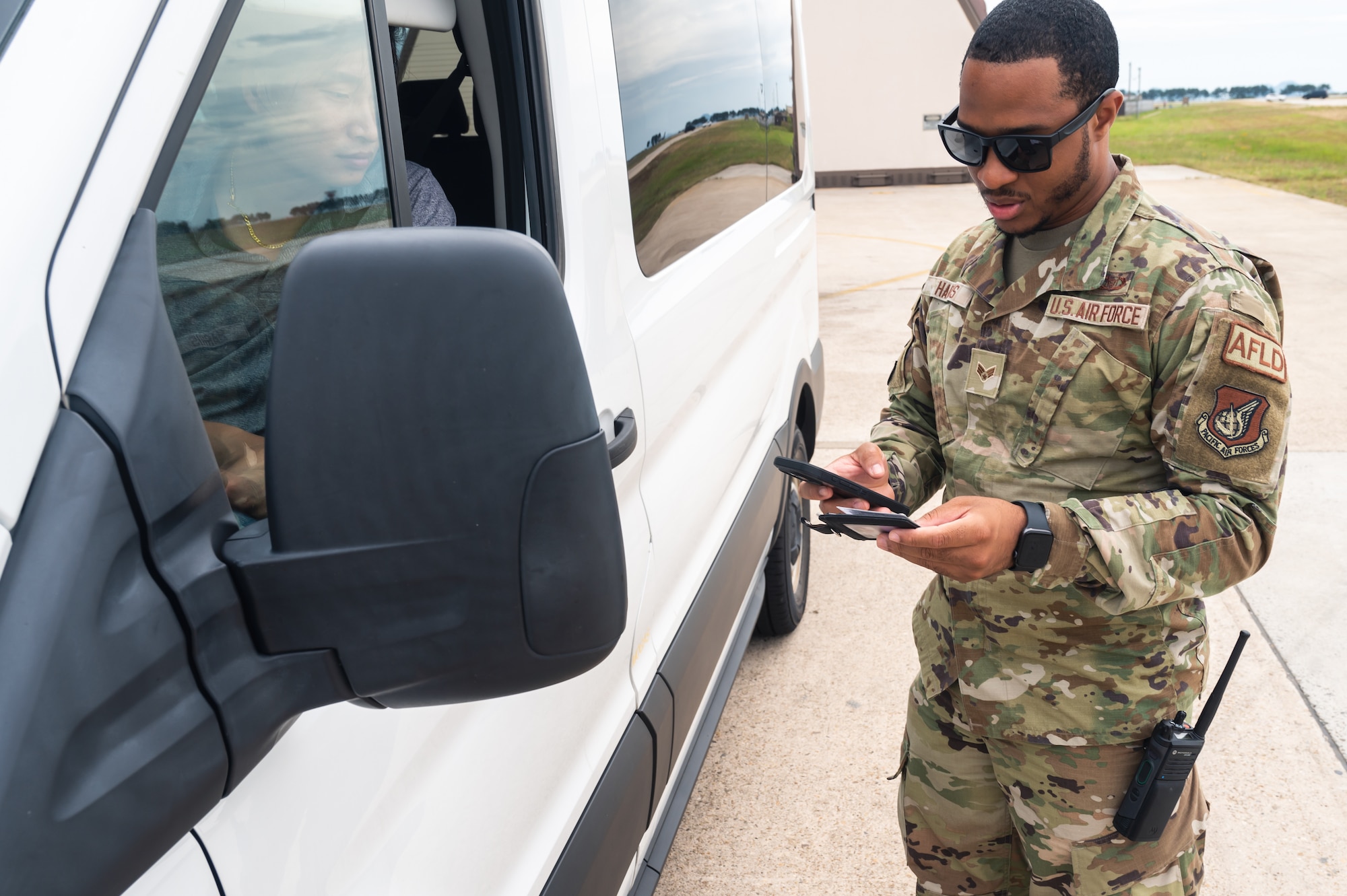 Senior Airman Nigel Harris, 8th Operational Support Squadron airfield management specialist, conducts an airfield driver's license check on the flightline.