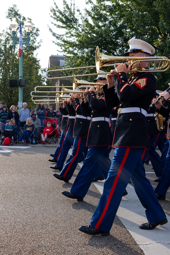 U.S. Marines with 2nd Marine Aircraft Wing (MAW) Band march in formation during the Pro Football Hall of Fame Canton Repository Parade in Canton, Ohio, Aug. 5th, 2023. Marines with the 2nd MAW Band performed during the parade to strengthen community relationships and reaffirm history, customs, and traditions representative of the United States Marine Corps to those in attendance. 2nd MAW is the aviation combat element of II Marine Expeditionary Force. (U.S. Marine Corps photo by Cpl. Christopher Hernandez)