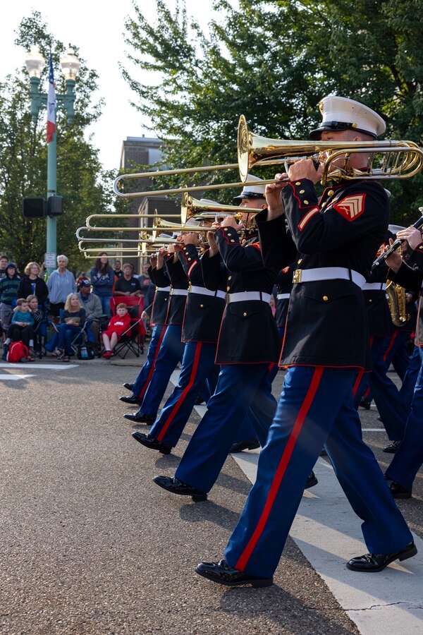 U.S. Marines with 2nd Marine Aircraft Wing (MAW) Band march in formation during the Pro Football Hall of Fame Canton Repository Parade in Canton, Ohio, Aug. 5th, 2023. Marines with the 2nd MAW Band performed during the parade to strengthen community relationships and reaffirm history, customs, and traditions representative of the United States Marine Corps to those in attendance. 2nd MAW is the aviation combat element of II Marine Expeditionary Force. (U.S. Marine Corps photo by Cpl. Christopher Hernandez)