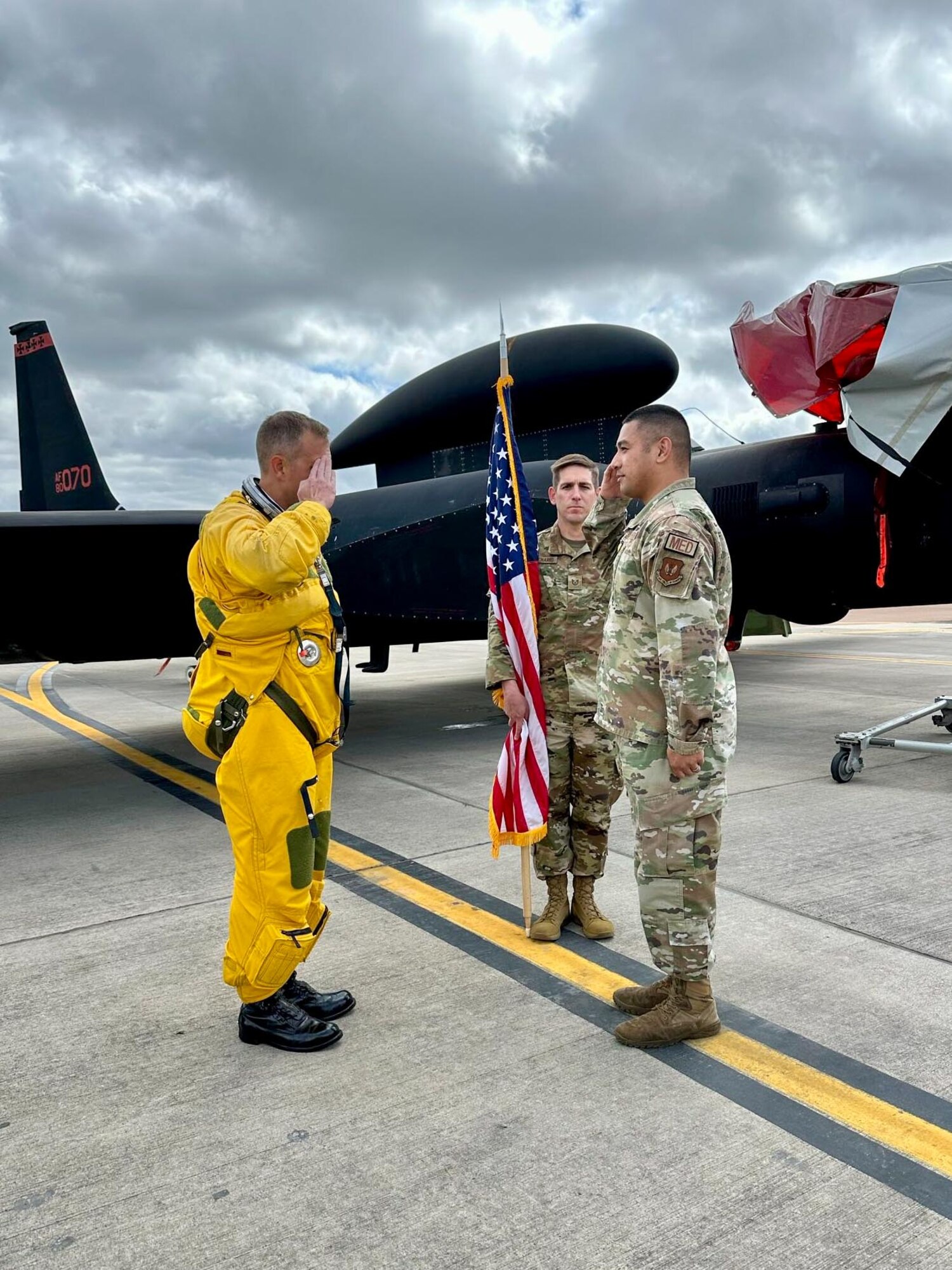 An Airman reenlists outside of a U-2