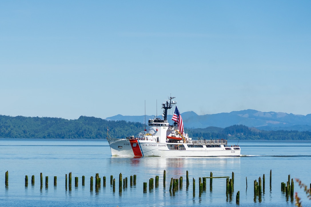 The crew of Coast Guard Cutter Alert departs Astoria, Oregon, on the Columbia River May 10, 2024. Alert is a 210-foot Medium Endurance Cutter. (U.S. Coast Guard photo by Petty Officer 1st Class Travis Magee)