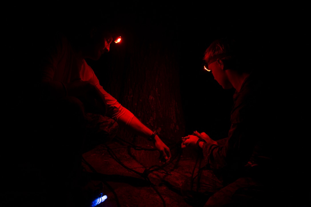 U.S. Marines with the 26th Marine Expeditionary Unit (MEU), prepare to recover a simulated casualty while conducting a tactical recovery of aircraft personnel (TRAP) during Amphibious Ready Group/MEU Exercise (ARGMEUEX) at Camp Burnt Gin, South Carolina, April 25, 2023. TRAP training develops the MEU’s capability to recover isolated personnel and aircraft in hostile, uncertain and permissive environments. Expeditionary Operations Training Group organized ARGMEUEX as part of the 26th MEU’s third phase of the pre-deployment training to ensure their Marines and Sailors, in partnership with their Navy teammates, are ready to serve as a formidable deterrent capable of performing missions across a full range of military operations from the sea. (U.S. Marine Corps photo by Pfc. Adam Scalin)