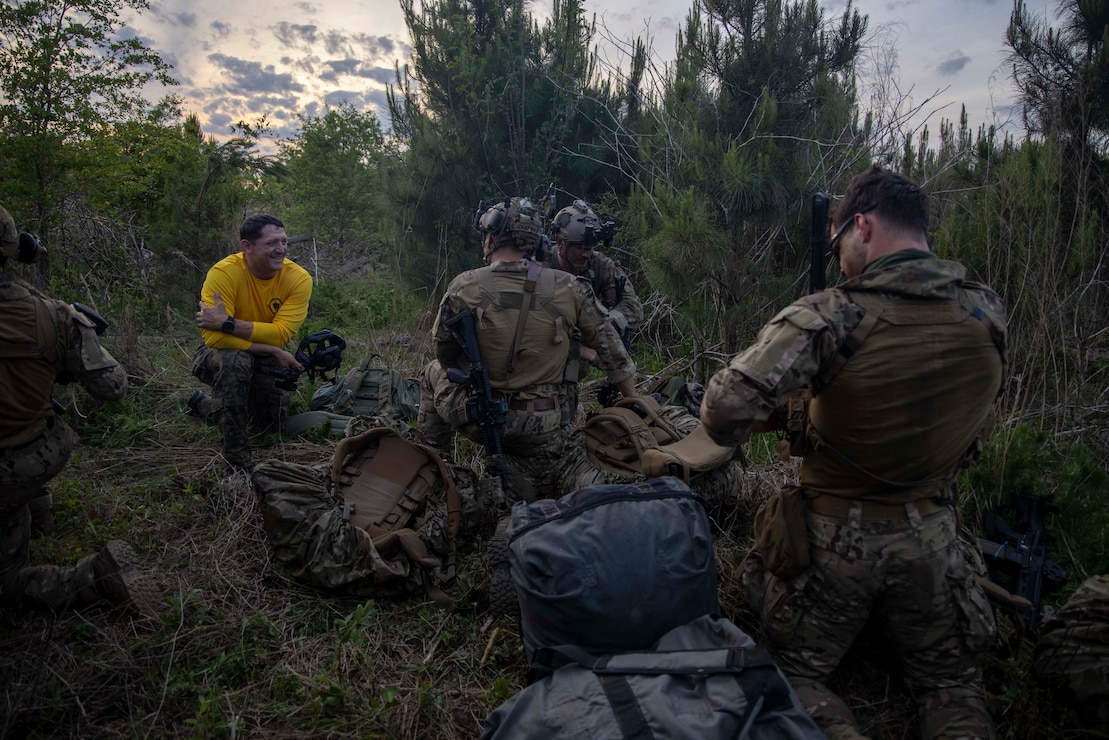 U.S. Marines with the 26th Marine Expeditionary Unit (MEU), consolidate during Amphibious Ready Group/MEU Exercise (ARGMEUEX) at Camp Burnt Gin, South Carolina, April 24, 2023. Tactical insertion training develops the MEU’s capability to insert into uncertain and permissive environments while maintaining a low profile. Expeditionary Operations Training Group organized ARGMEUEX as part of the 26th MEU’s third phase of the pre-deployment training to ensure their Marines and Sailors, in partnership with their Navy teammates, are ready to serve as a formidable deterrent capable of performing missions across a full range of military operations from the sea. (U.S. Marine Corps photo by Pfc. Adam Scalin)