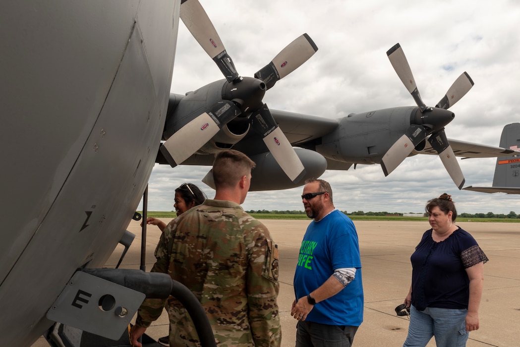 Military spouses on a C-130H Hercules flight.