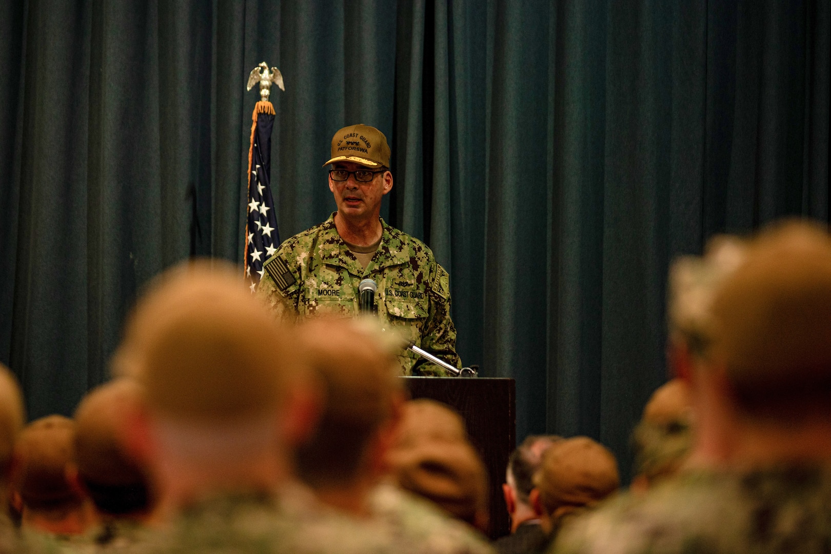 Vice Adm. Nathan Moore, commander, Atlantic Area, delivers his remarks during a change-of-command ceremony for Coast Guard Patrol Forces Southwest Asia, June 18, 2024, in Manama, Bahrain. The change-of-command ceremony is a military tradition representing a formal transfer of authority and responsibility for a unit from one commanding officer to another. (U.S. Army photo by Sgt. Julio Hernandez)