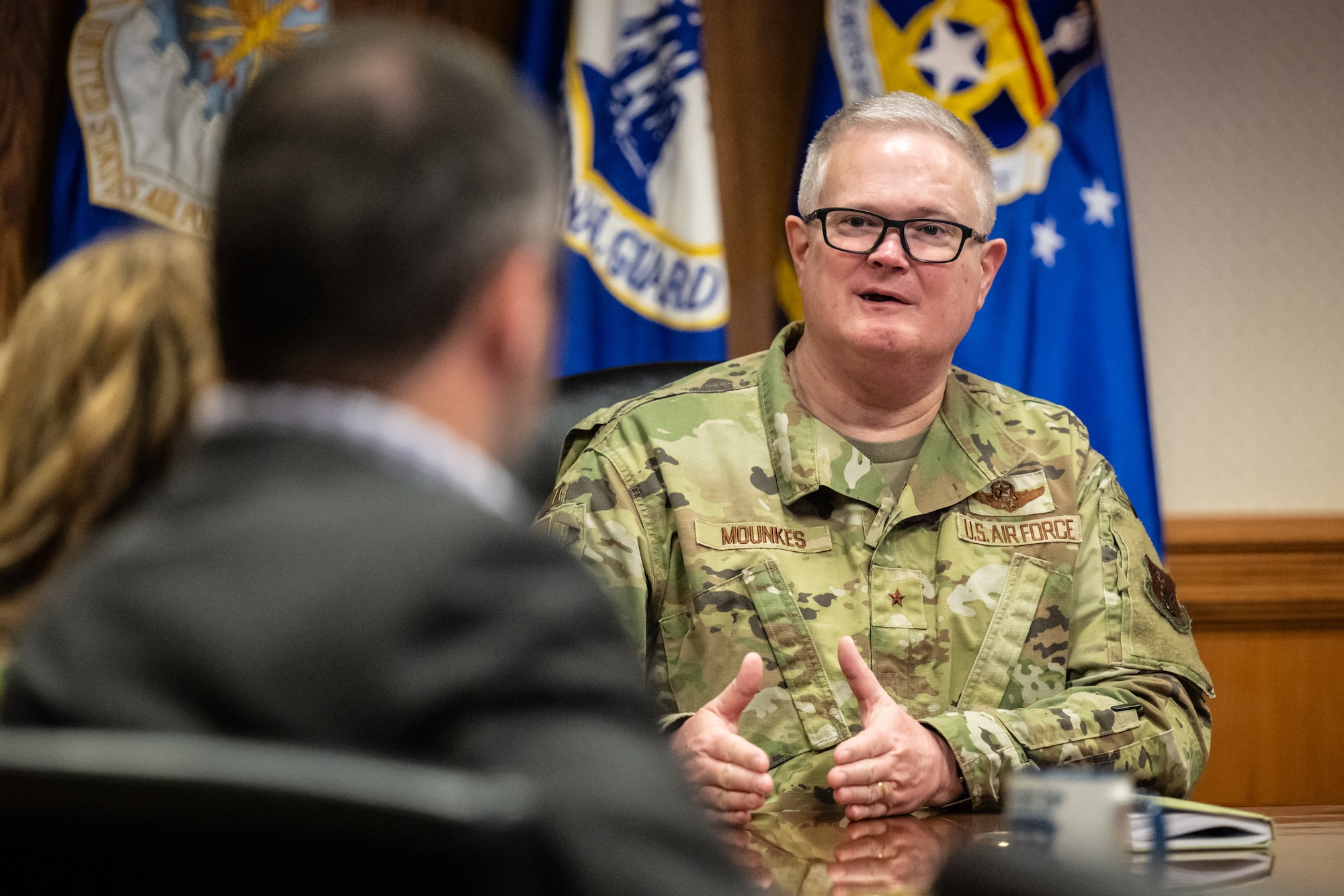 Brig. Gen. David Mounkes, the Kentucky National Guard’s assistant adjutant general for Air, briefs administrators from Jefferson County Public Schools about career opportunities for graduating high schoolers at the Kentucky Air National Guard base in Louisville, Ky., March 14, 2024. The base is home to about 1,200 Airmen and eight C-130J Super Hercules aircraft, with missions spanning the gamut from tactical airlift, special operations, disaster response, explosive ordnance disposal and aircraft maintenance to civil engineering, cyber communications, security forces, medical care and logistics. (U.S. Air National Guard photo by Dale Greer)