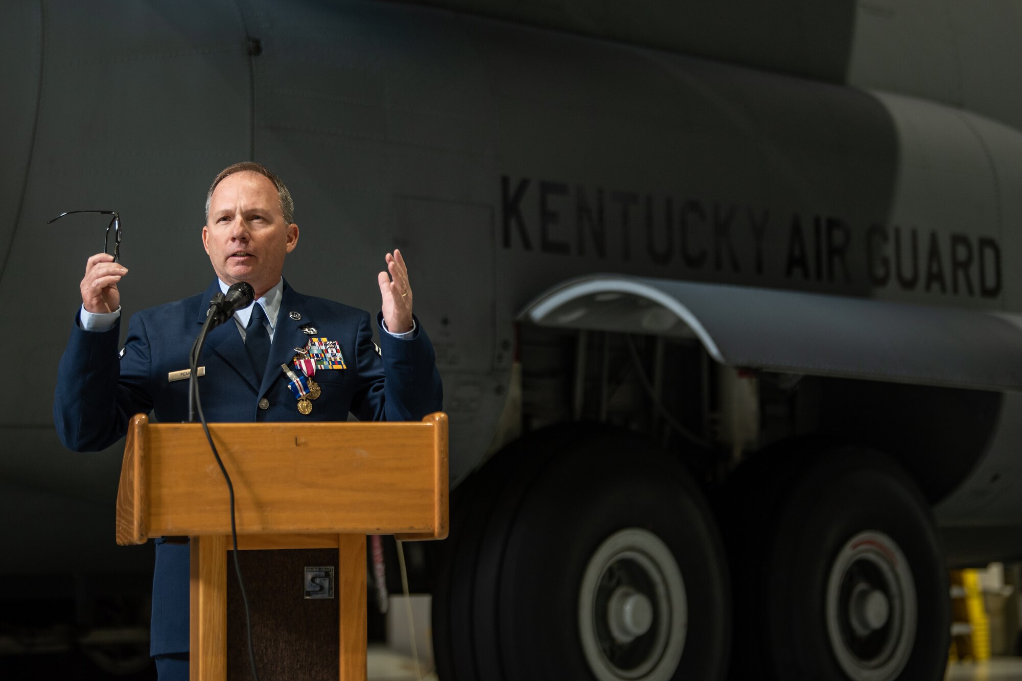 Chief Master Sgt. Alan Peake speaks to an audience of fellow Airmen, family and friends during his retirement ceremony at the Kentucky Air National Guard Base in Louisville, Ky., Apr. 21, 2024. Peake retired as the maintenance production superintendent for the 123rd Aircraft Maintenance Squadron after more than 36 years of service. (U.S. Air National Guard photo by Staff Sgt. Chloe Ochs)