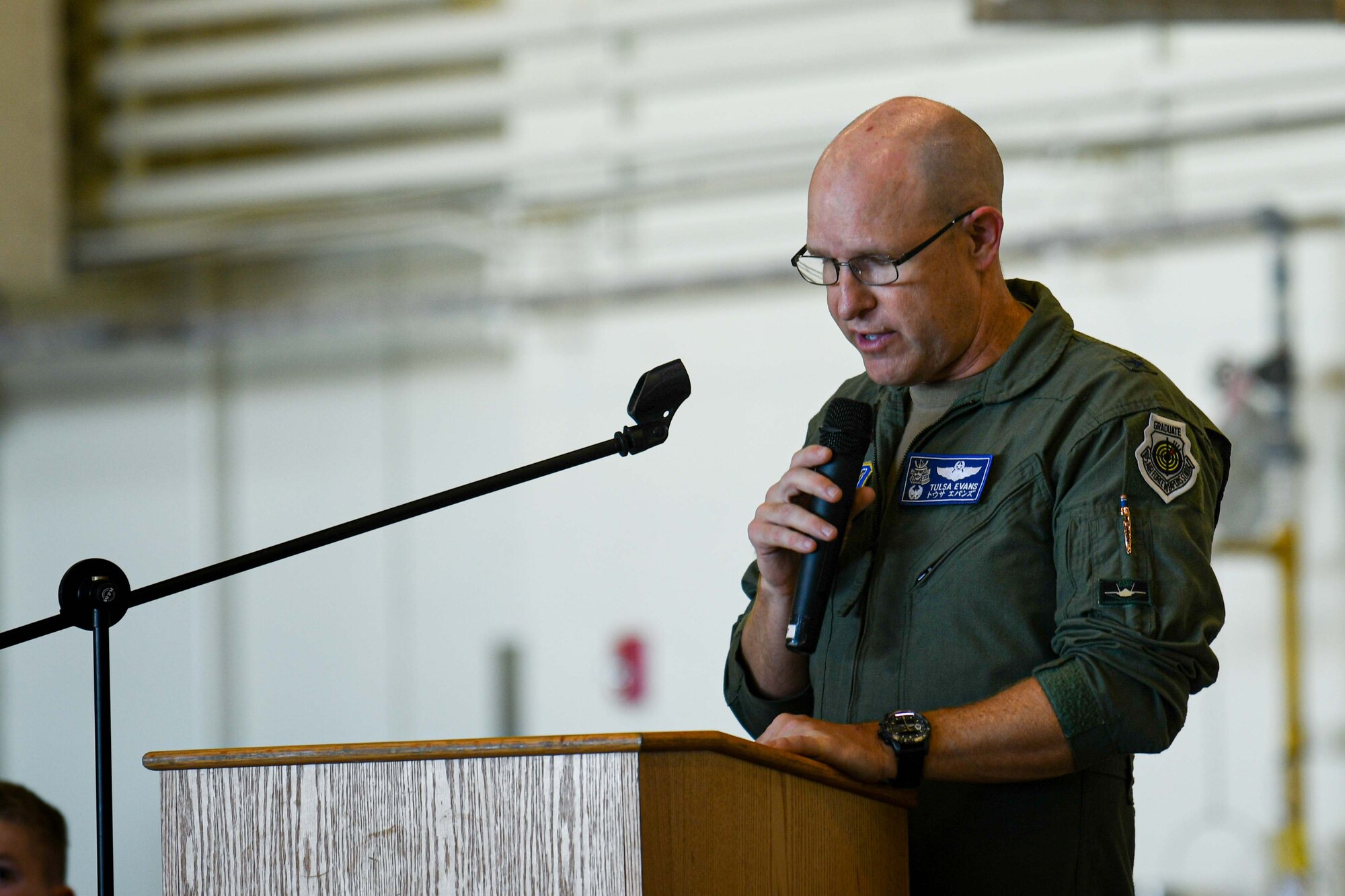 U.S. Air Force Brig. Gen. Nicholas Evans, 18th Wing commander, speaks during the 18th Operations Group change of command ceremony at Kadena Air Base, Japan, June 25, 2024.