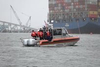 A U.S. Coast Guard boat crew aids in the transfer of the Embassy of India’s Charge d'Affaires Sripriya Ranganathan, to the Motor Vessel Dali in the Patapsco River April 2, 2024.