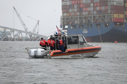 A U.S. Coast Guard boat crew aids in the transfer of the Embassy of India’s Charge d'Affaires Sripriya Ranganathan, to the Motor Vessel Dali in the Patapsco River April 2, 2024.