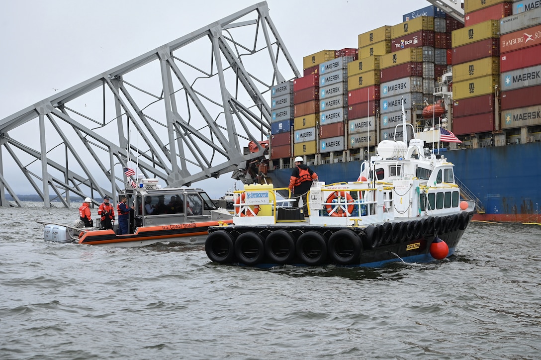 U.S. Coast Guard and partner agency boat crews work together in the Patapsco River April 2, 2024 during the Francis Scott Key Bridge response in Baltimore, Maryland.