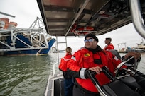 U.S. Coast Guard response boat crews enforce a safety zone, April 1, 2024, after the collapse of the Francis Scott Key Bridge in Baltimore, Maryland.