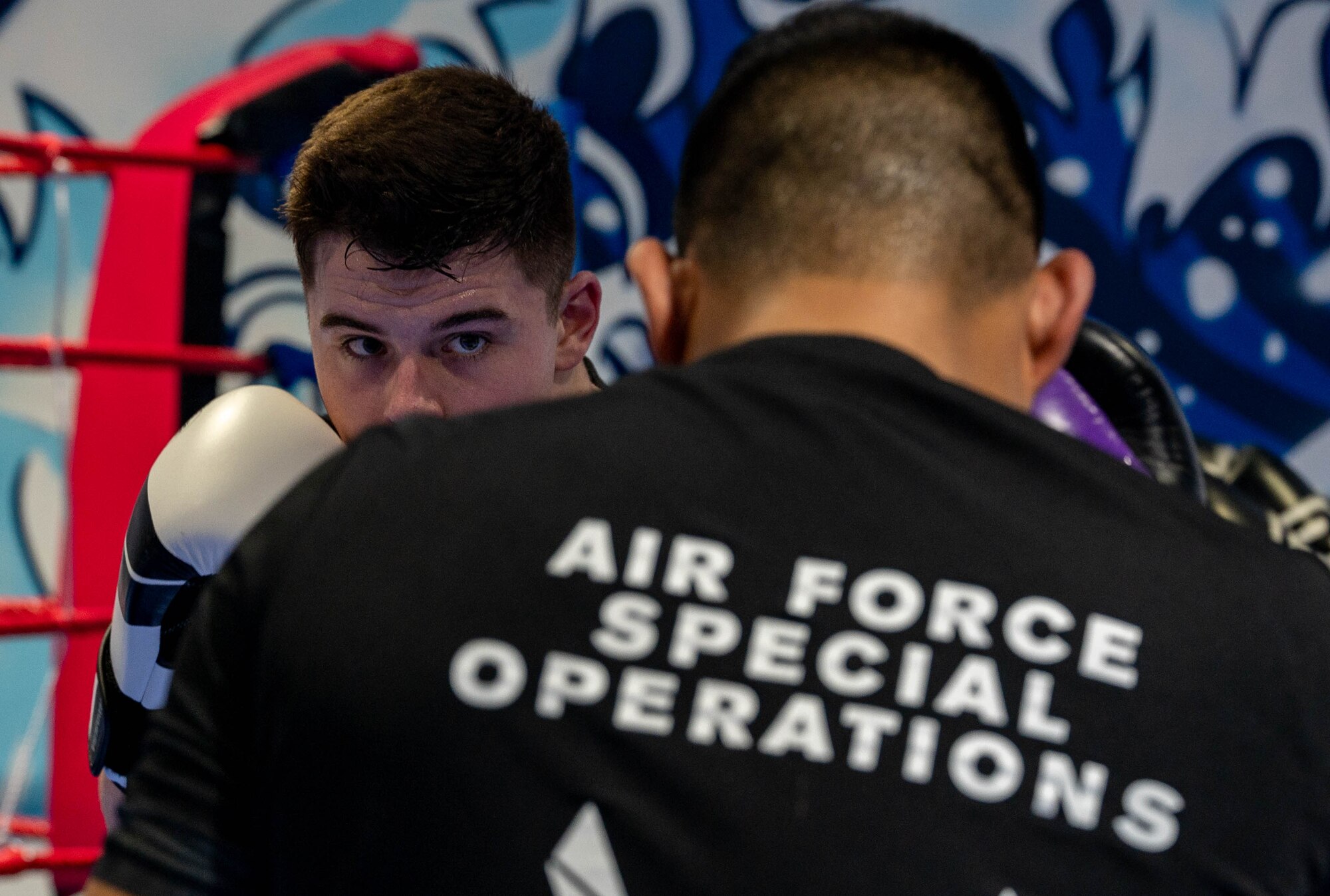 Liberty Wing Airmen spar during a kickboxing session