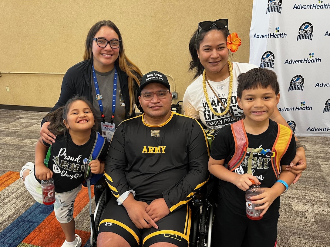 U.S. Army Sgt. 1st Class Jack Peko and family take a break in between precision air competitions at the 2024 Department of Defense Warrior Games