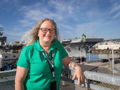 Denise Harrington, deputy carrier program manager, Code 312, Carrier Program, is a fourth-generation Puget Sound Naval Shipyard & Intermediate Maintenance Facility employee. She began her shipyard career in 1988. (U.S. Navy photo by Wendy Hallmark)