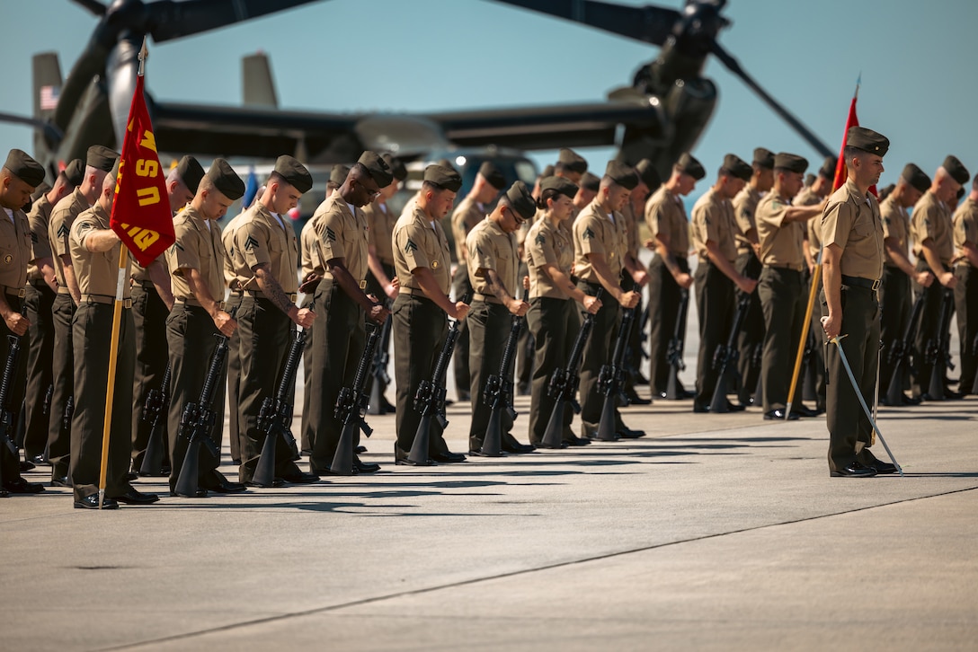 U.S. Marines with Marine Corps Air Facility Quantico stand in formation during a change of command ceremony on Marine Corps Base Quantico, Virginia, June 21, 2024. U.S. Marine Corps Col. Bradley Harms, the outgoing commanding officer of Marine Helicopter Squadron One, was relieved by Col. Ryan Shadle. (U.S. Marine Corps photo by Lance Cpl. Joaquin Dela Torre)