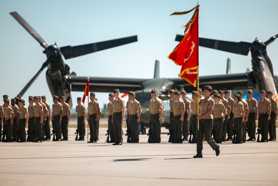 U.S. Marine Corps Sgt. Maj. Sara Lopez, sergeant major of Marine Helicopter Squadron One, receives the colors during a change of command ceremony on Marine Corps Base Quantico, Virginia, June 21, 2024. U.S. Marine Corps Col. Bradley Harms, the outgoing commanding officer of Marine Helicopter Squadron One, was relieved by Col. Ryan Shadle. (U.S. Marine Corps photo by Lance Cpl. Joaquin Dela Torre)