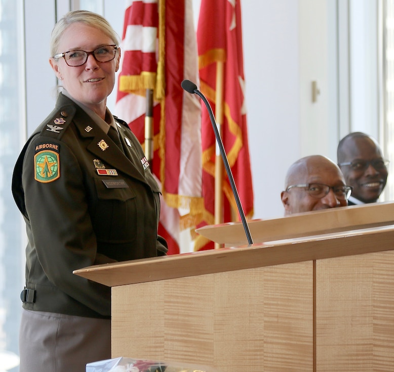 Col. Beth Roxworthy thanks her personnel officer, Maj. James Brock, during her promotion ceremony. Roxworthy, the Commander of the Illinois Army National Guard's Chicago-based 34th Division Sustainment Brigade, spoke about what she learned during each stage of her military career from the value of friendship as a lower enlisted Soldier to the meaning of sacrifice from getting to know the Gold Star family of Sgt. Simone Robinson. Roxworthy was promoted to colonel on Friday, June 21, in Chicago.