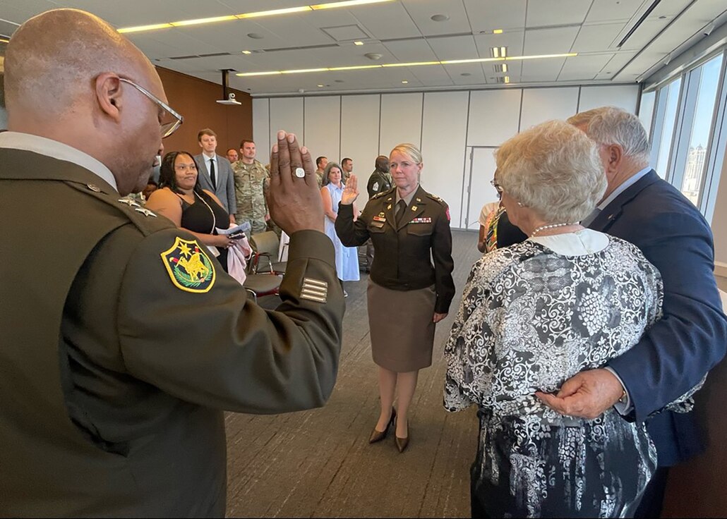 Col. Beth Roxworthy takes the Oath of Office during her promotion ceremony. Roxworthy, the Commander of the Illinois Army National Guard's Chicago-based 34th Division Sustainment Brigade, was promoted to colonel on Friday, June 21, in Chicago. Maj. Gen. Rodney Boyd, the 41st Adjutant General for Illinois and Commander of the Illinois National Guard, promoted Roxworthy and administered her Oath of Office.