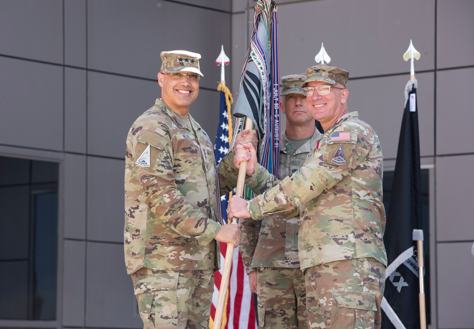 U.S. Space Force Col. David A. Pheasant, right, relinquishes command of Space Delta 8 – Satellite Communications to Lt. Gen. David N. Miller, Jr., Space Operations Command commander, left, during a change of command ceremony at Schriever Space Force Base, Colorado, June 24, 2024. Pheasant took command of DEL 8 in July of 2022. (U.S. Space Force photo by 1st Lt. Danielle Rose)