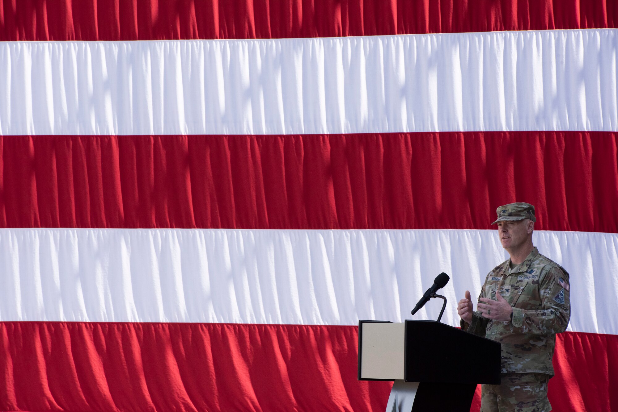 U.S. Space Force Col. Jeffrey E. Weisler gives his first speech as the Space Delta 8 commander – Satellite Communications to the men and women of DEL 8 during a change of command ceremony at Schriever Space Force Base, Colorado, June 24, 2024. Weisler is the third commander to lead DEL 8 since it was activated on July 24, 2020. (U.S. Space Force photo by 1st Lt. Danielle Rose)
