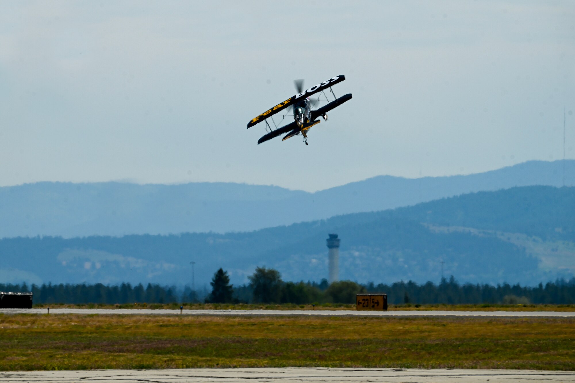 A S-1-11B aircraft flies in the sky.
