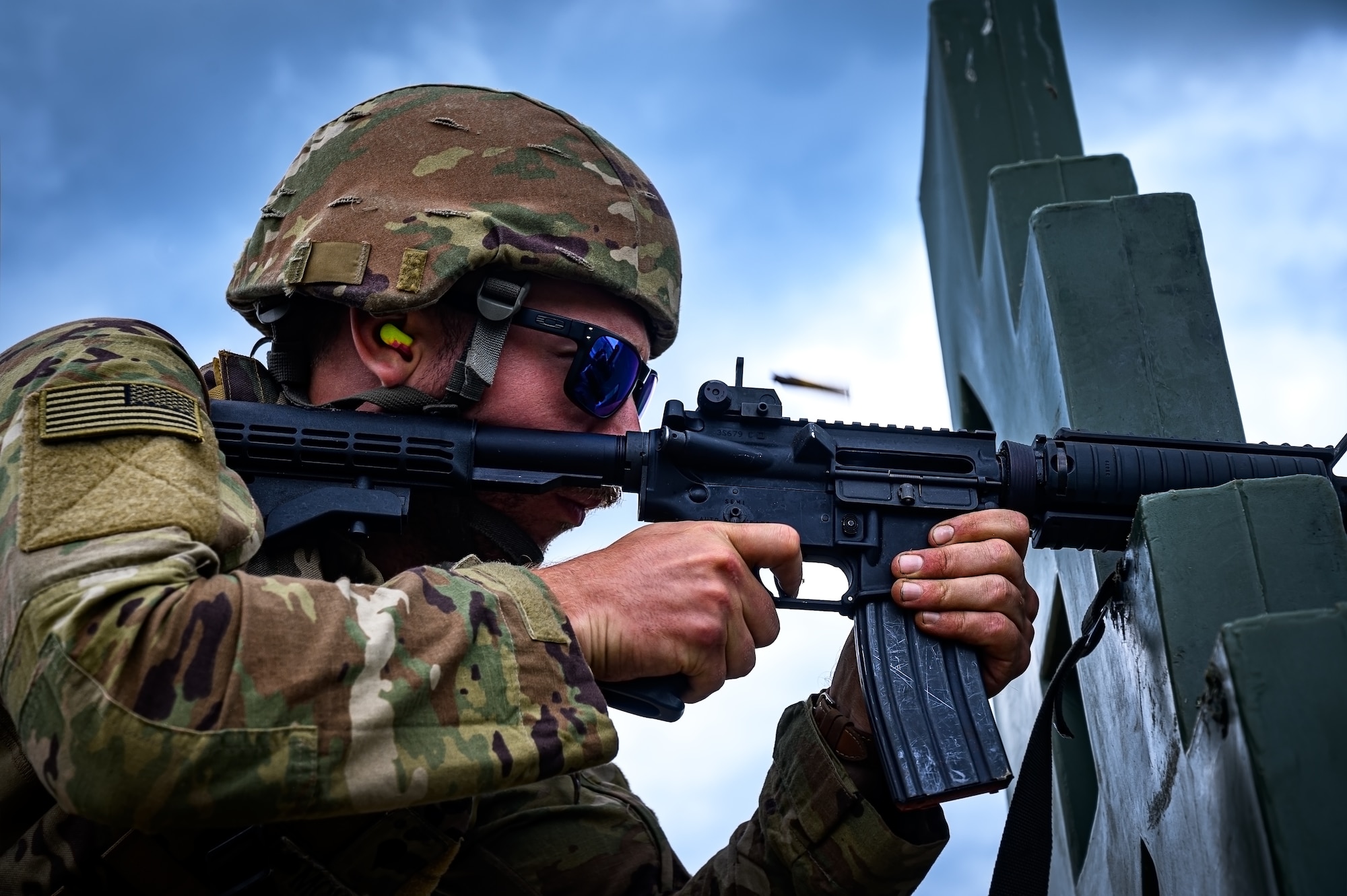 U.S. Army Reserve Staff Sgt. Michael Morris, 316th Sustainment Command petroleum supply specialist, performs a weapons qualification at Joint Base McGuire-Dix-Lakehurst, N.J., June 10, 2024. Reservists are required to attend a two-week training exercise annually, where they engage in realistic scenarios designed to prepare them for real-world conflicts. (U.S. Air Force photo by Senior Airman Matt Porter)