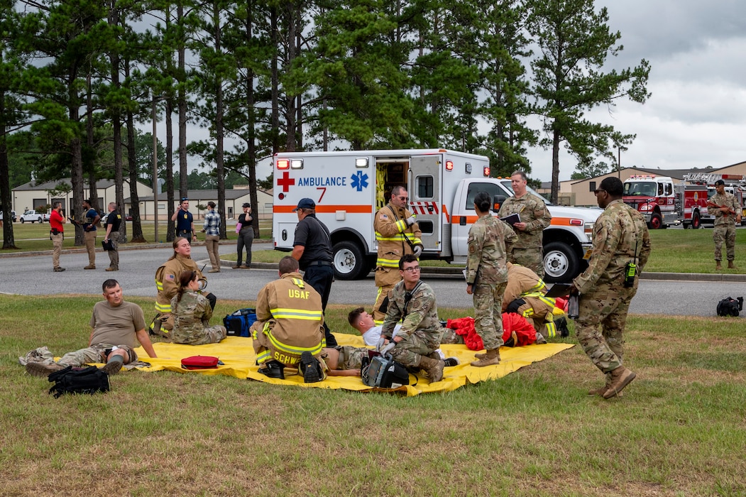 First responders assigned to the 23rd Wing set up a triage point at Moody Air Force Base, Georgia, June 20, 2024. Inspectors oversaw the medical response of the Airmen after the exercise scene was rendered safe. The goal of the exercise was to assess and improve base personnel and security forces’ actions and response to an active shooter incident. (U.S. Air Force photo by Airman 1st Class Leonid Soubbotine)