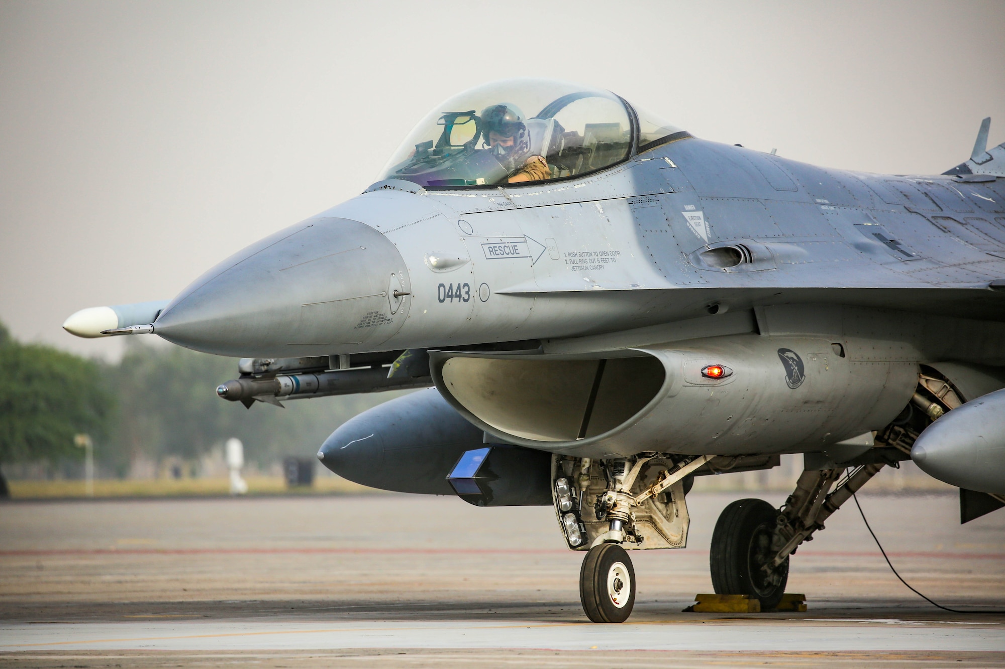 A U.S. Air Force F-16 Fighting Falcon pilot from Aviano Air Base’s 510th Expeditionary Fighter Squadron, also known as the ‘Buzzards,’ currently deployed to the U.S. Central Command area of responsibility, prepares to taxi out for a flight in an undisclosed location in Pakistan during Exercise Falcon Talon, June 4, 2024.