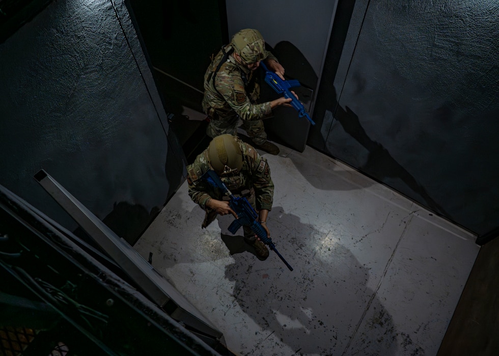 Airmen assigned to the 23rd Security Forces Squadron clear a room at Moody Air Force Base, Georgia, June 20, 2024. Security forces were the first to respond to the simulated active shooter scene and neutralize the threat. The goal of the exercise was to assess and improve base personnel and security forces’ actions and response to an active shooter incident. (U.S. Air Force photo by Airman 1st Class Leonid Soubbotine)