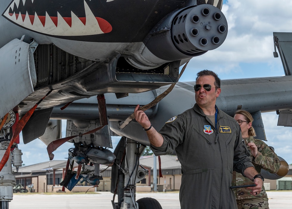 U.S. Air Force Col. Nicholas DiCapua, 23rd Fighter Group commander, inspects an A-10C Thunderbolt II aircraft during a Top Tiger competition at Moody Air Force Base, Georgia, June 21, 2024. Base leadership had an opportunity to inspect the aircraft and score the crew chief teams on their efforts. (U.S. Air Force photo by Airman 1st Class Leonid Soubbotine)