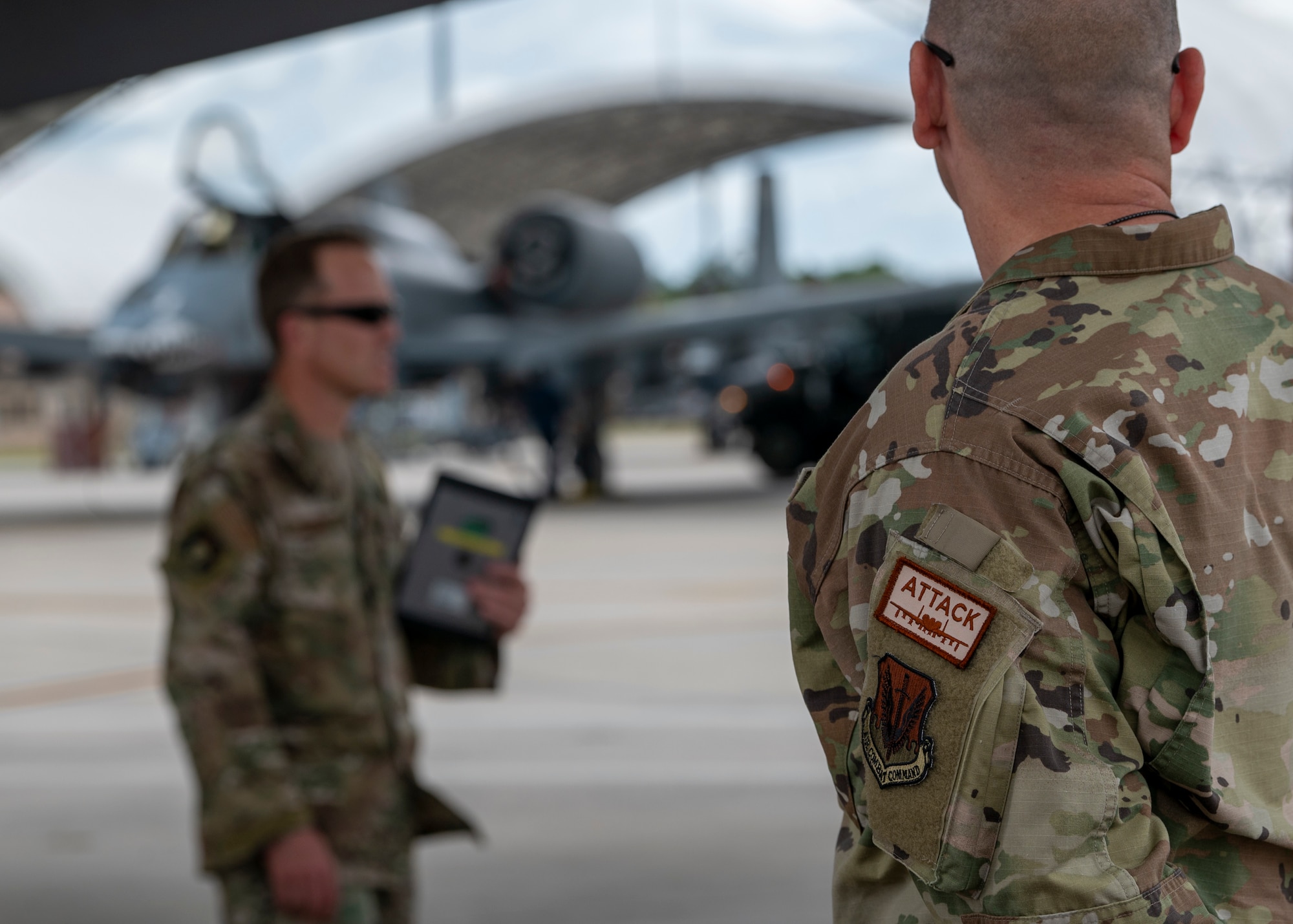 U.S. Air Force 23rd Wing leadership judges a Top Tiger competition at Moody Air Force Base, Georgia, June 21, 2024. Each quarter base leadership observes and scores the crew chiefs on their knowledge and maintenance of the aircraft. (U.S. Air Force photo by Airman 1st Class Leonid Soubbotine)
