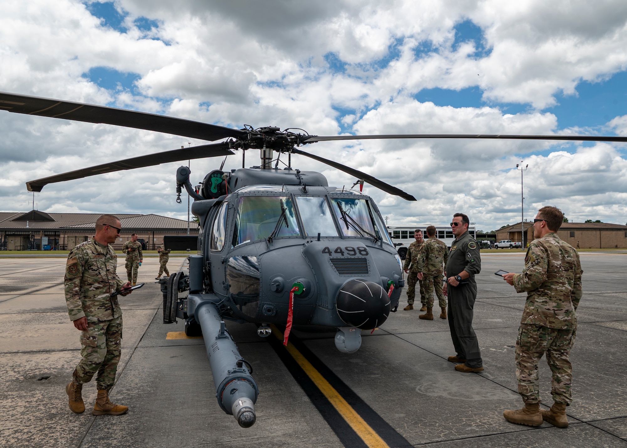 U.S. Air Force 23rd Wing leadership inspect an HH-60W Jolly Green II during a Top Tiger competition at Moody Air Force Base, Georgia, June 21, 2024. Throughout the competition, wing and group leadership graded Airmen on their aircraft cleanliness, appearance, forms and maintenance knowledge. (U.S. Air Force photo by Airman 1st Class Leonid Soubbotine)