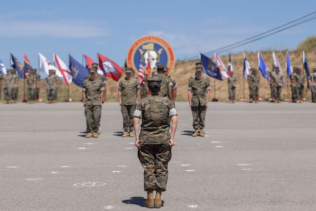 U.S. Marine Corps Lt. Col. Mabel B. Annunziata, oncoming commanding officer of 1st Radio Battalion, I Marine Expeditionary Information Group, dismisses the battalion during a change of command ceremony at Marine Corps Base Camp Pendleton, California, June 24, 2024. The change of command ceremony was held to commemorate the passing of command from Lt. Col. Curtis A. Williamson to Annunziata. Williamson is a native of Texas, and Annunziata is a native of Florida. (U.S. Marine Corps photo by Sgt. Michael Virtue)