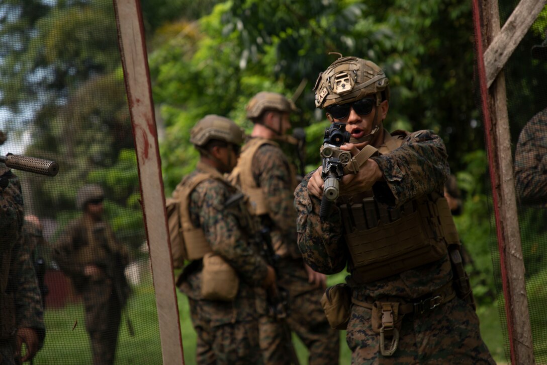 U.S. Marine Corps Pfc. Cameron Lucas, a rifleman with 1st Battalion, 7th Marine Regiment, 1st Marine Division, conducts close-quarters battle training during Archipelagic Coastal Defense Continuum in Barira, Philippines, May 20, 2024. ACDC is a series of bilateral exchanges and training opportunities between U.S. Marines and Philippine Marines aimed at bolstering the Philippine Marine Corps’ Coastal Defense strategy while supporting the modernization efforts of the Armed Forces of the Philippines. Lucas is a native of North Carolina. (U.S. Marine Corps photo by Cpl. Kayla Halloran)