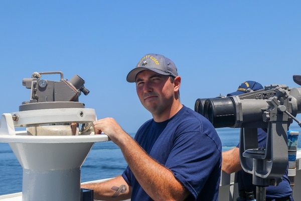 U.S. Coast Guard Petty Officer 2nd Class Ryan Kass, a boatswain’s mate assigned to Coast Guard Cutter Hamilton (WMSL 753), during his first underway Officer of the Deck watch, Panama City, Panama, March 2, 2024. Kass spotted a vessel in distress and deployed the Hamilton’s rescue and assistance team. (U.S. Coast Guard photo by LTJG Ray Corniel)