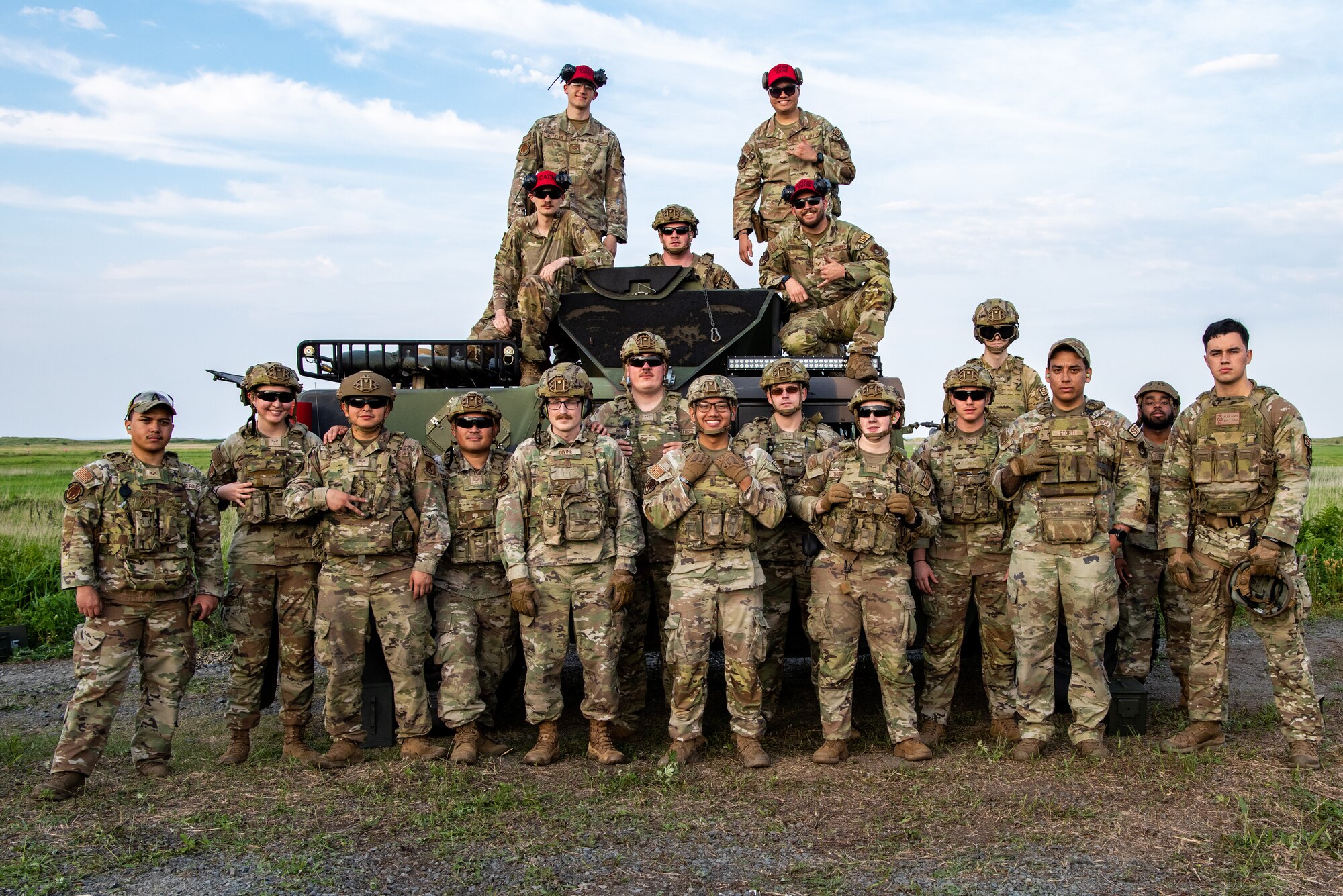 U.S. Air Force Airmen assigned to the 35th Security Forces Squadron pose for a group photo after heavy weapons qualification at Draughon Range near Misawa Air Base, Japan, June 18, 2024.