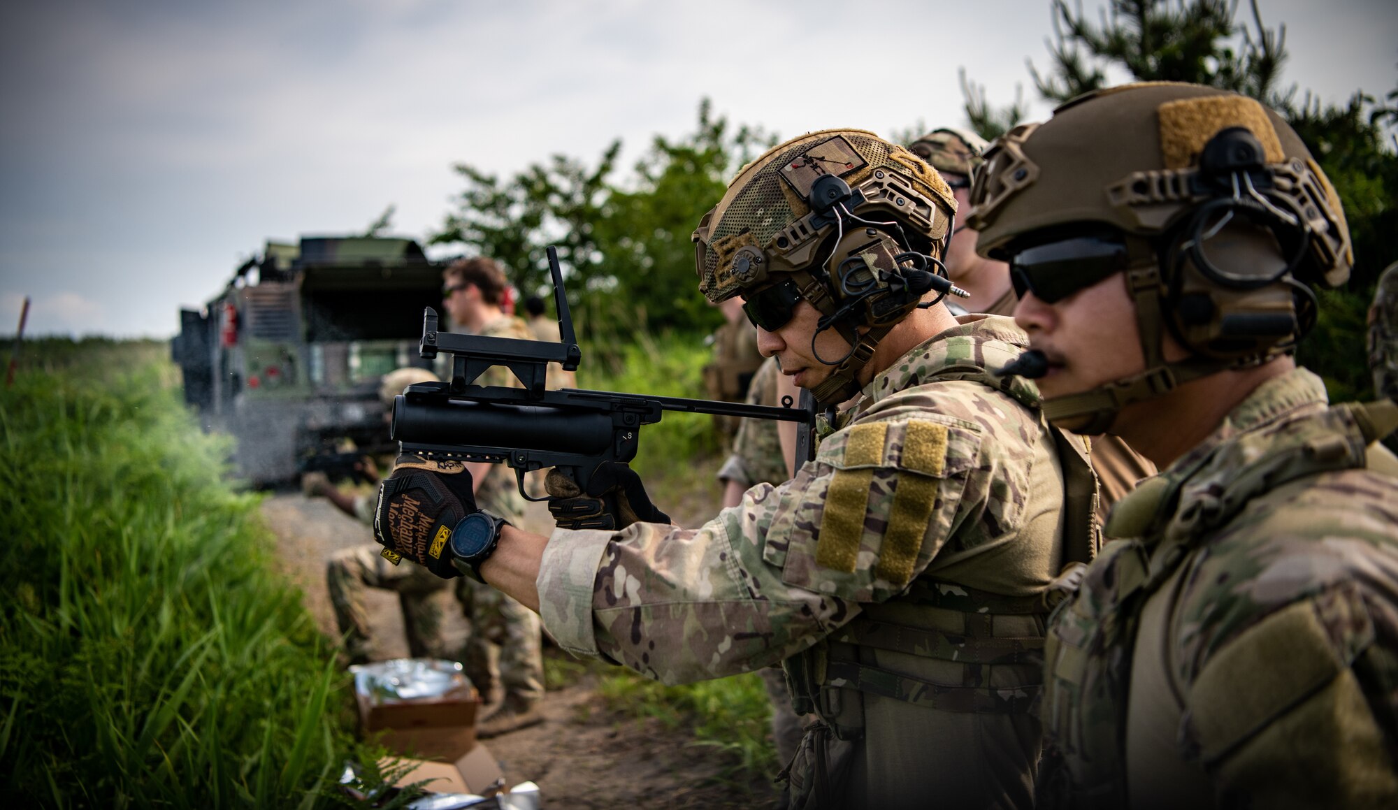 A U.S. Air Force 35th Civil Engineer Squadron Explosive Ordnance Disposal member fires the M320A1 grenade launcher during heavy weapons qualification at Draughon Range, near Misawa Air Base, Japan, June 18, 2024.