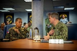 Vice Adm. Fred Kacher, right, Commander, U.S. 7th Fleet, speaks with Philippine Navy Rear Adm. Renato David, Commander, Philippine Fleet, during U.S. – Philippines Staff Talks aboard the 7th Fleet flagship USS Blue Ridge (LCC 19) during a port visit to Manila, Philippines, June 21, 2024.