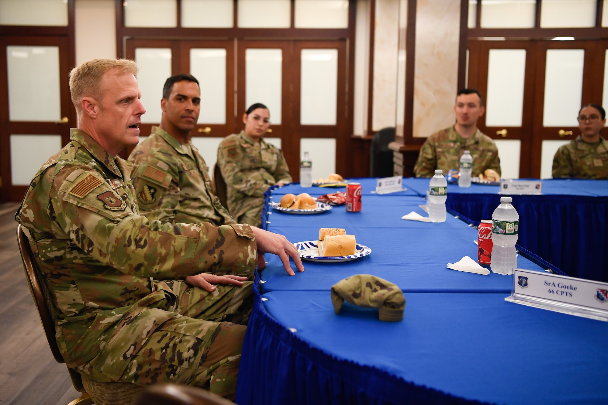 Air Force Chief Master Sergeant speaks with Airmen