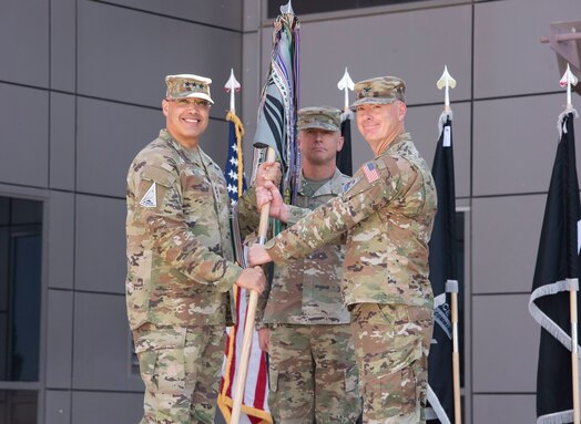  U.S. Space Force Col. Jeffrey E. Weisler, right, takes command of Space Delta 8 – Satellite Communications from Lt. Gen. David N. Miller, Jr., Space Operations Command commander, left, during a change of command ceremony at Schriever Space Force Base, Colorado, June 24, 2024. Weisler is the third commander to lead DEL 8 since it was activated on July 24, 2020. (U.S. Space Force photo by 1st Lt. Danielle Rose)