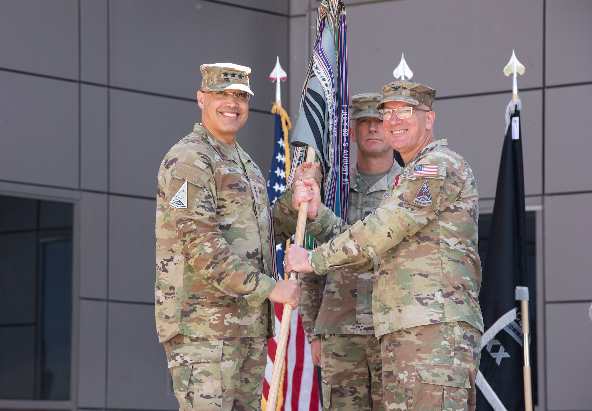 U.S. Space Force Col. David A. Pheasant, right, relinquishes command of Space Delta 8 – Satellite Communications to Lt. Gen. David N. Miller, Jr., Space Operations Command commander, left, during a change of command ceremony at Schriever Space Force Base, Colorado, June 24, 2024. Pheasant took command of DEL 8 in July of 2022. (U.S. Space Force photo by 1st Lt. Danielle Rose)