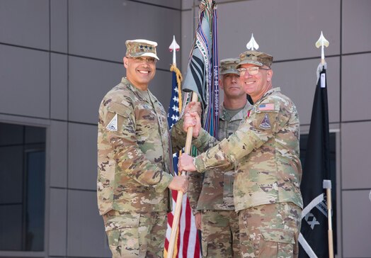  U.S. Space Force Col. David A. Pheasant, right, relinquishes command of Space Delta 8 – Satellite Communications to Lt. Gen. David N. Miller, Jr., Space Operations Command commander, left, during a change of command ceremony at Schriever Space Force Base, Colorado, June 24, 2024. Pheasant took command of DEL 8 in July of 2022. (U.S. Space Force photo by 1st Lt. Danielle Rose)