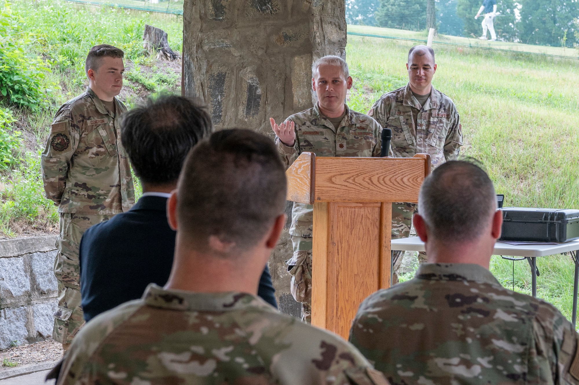 U.S. Air Force Maj. Brent Johnson, Air Force Technical Applications Center, 709th Technical Maintenance Squadron, Detachment 403 commander, gives his final speech before relinquishing command during a change of command ceremony at Osan Air Base, Republic of Korea, June 24, 2024. Johnson earned his commission through Officer Training School in 2005 and initially served as the officer in charge of Infrared Production at the National Air and Space Intelligence Center. (U.S. Air Force photo by Staff Sgt. Ashley N. Mikaio)