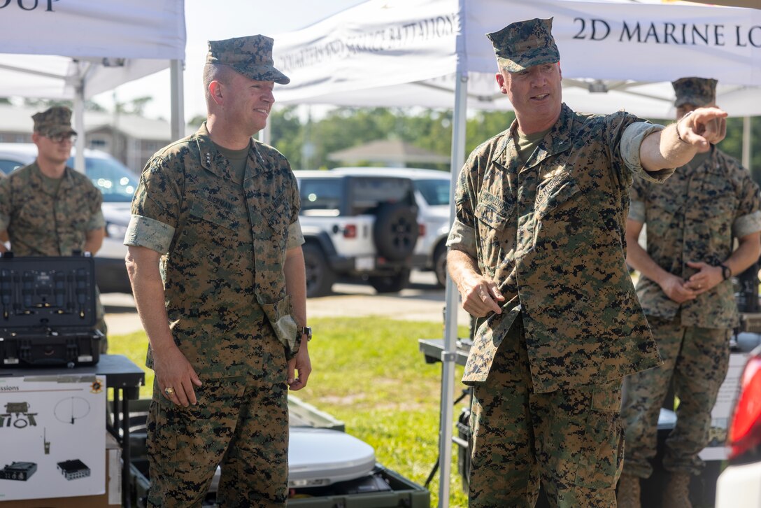 U.S. Marine Corps Lt. Gen. James W. Bierman, Jr., left, deputy commandant of Plans Policies and Operations, Headquarters Marine Corps, speaks with Brig. Gen. Michael E. McWilliams, commanding general, 2nd Marine Logistics Group, during a capabilities showcase on Camp Lejeune, North Carolina, June 13, 2024. Bierman visited II Marine Expeditionary Force to view capabilities as they relate to PP&O’s responsibilities of developing and executing plans related to the structure, deployment and employment of Marine Corps Forces. (U.S. Marine Corps photo by Lance Cpl. Jessica J. Mazzamuto)