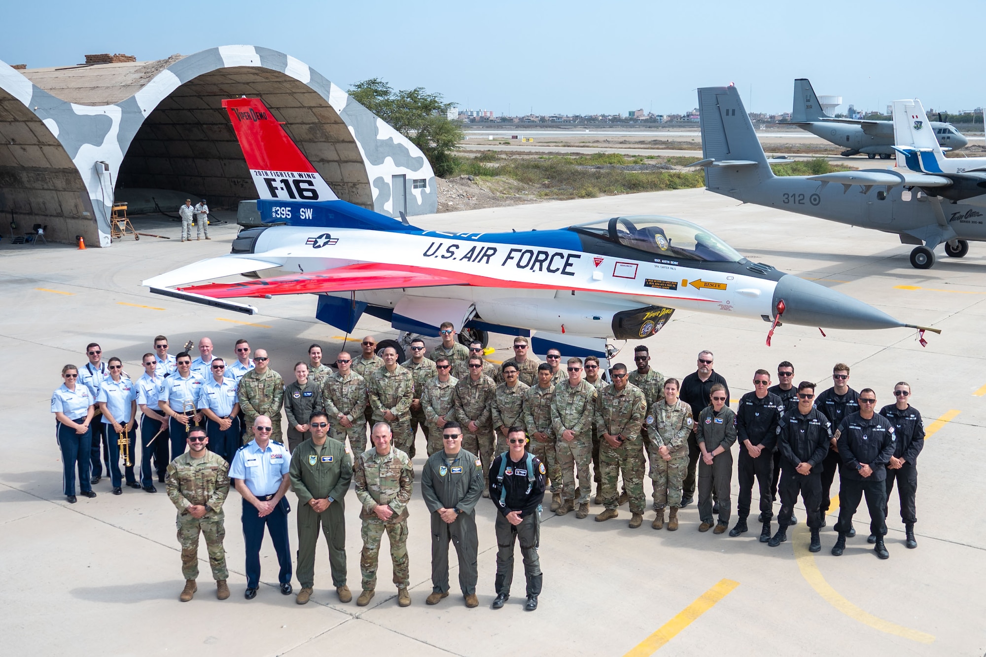U.S. Air Force active duty and civilian personnel pose for a photo during the Festival Aereo Chiclayo 2024 in Chiclayo, Peru, June 17, 2024.