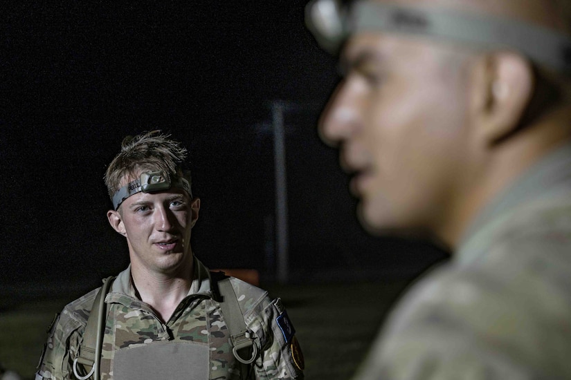 Soldiers take part in land navigation training.