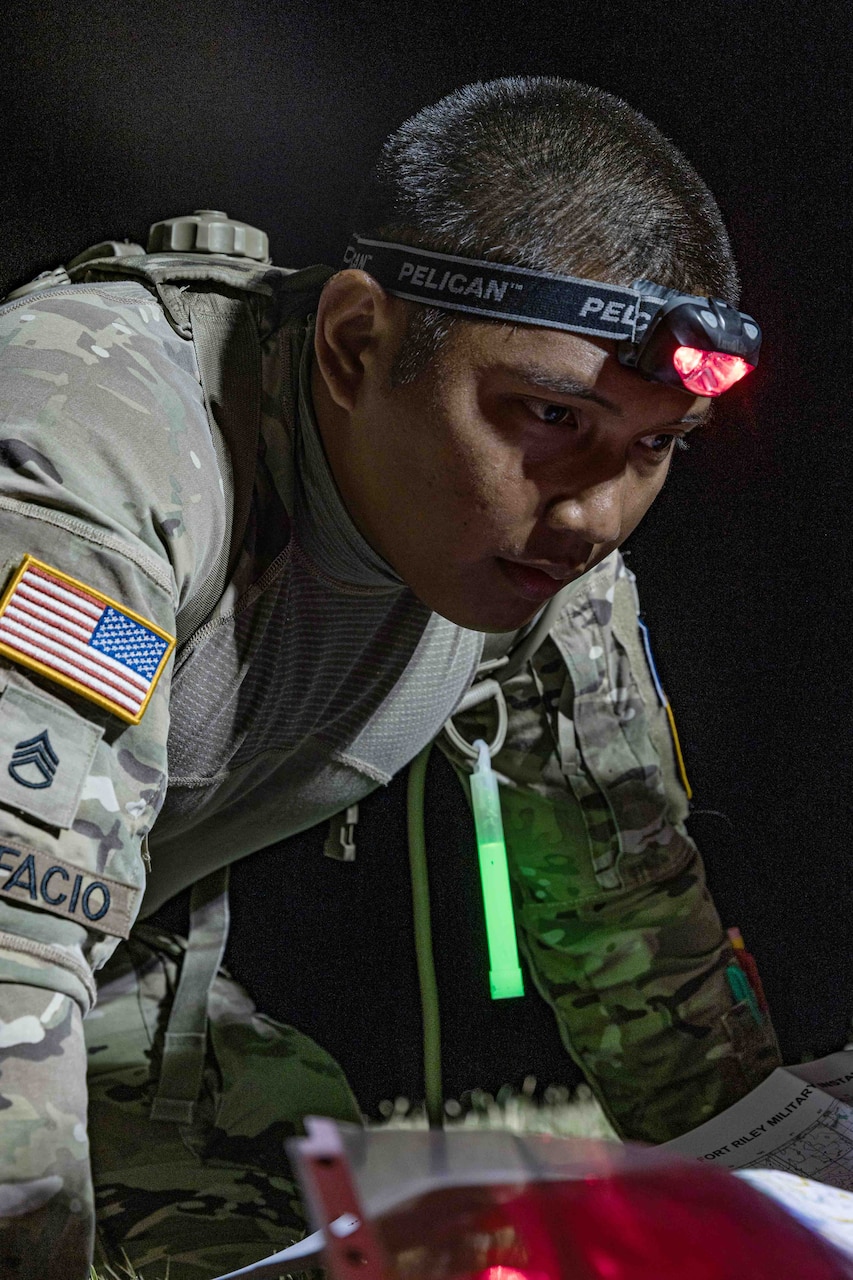 Soldiers take part in land navigation training.