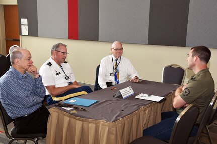 SAN ANTONIO – (June 25, 2024) – Dr. John Simecek (center right), director, Craniofacial Health and Restorative Medicine Directorate, Naval Medical Research Unit (NAMRU) San Antonio, participated in the Tri-Service Subject Matter Expert Panel Engagement Sessions during the inaugural AIM Health R&D Summit held at the Henry B. Gonzalez Convention Center. Joining him were representatives from the U.S. Army Institute of Surgical Research (USAISR), U.S. Air Force 59th Medical Wing (59th MDW), Brooke Army Medical Center (BAMC), and Department of Veterans Affairs (VA). Designed to promote cross-sector collaboration in the development of life-saving battlefield technologies, the summit combines three of San Antonio's leading life sciences events: Military Medical Industry Day (MMID), BexarBio pitch competition, and the San Antonio Military Health and Universities Research Forum (SURF).  NAMRU San Antonio’s mission is to conduct gap driven combat casualty care, craniofacial, and directed energy research to improve survival, operational readiness, and safety of Department of Defense (DoD) personnel engaged in routine and expeditionary operations. It is one of the leading research and development laboratories for the U.S. Navy under the DoD and is one of eight subordinate research commands in the global network of laboratories operating under the Naval Medical Research Command in Silver Spring, Md. (U.S. Navy photo by Burrell Parmer, NAMRU San Antonio Public Affairs/Released)